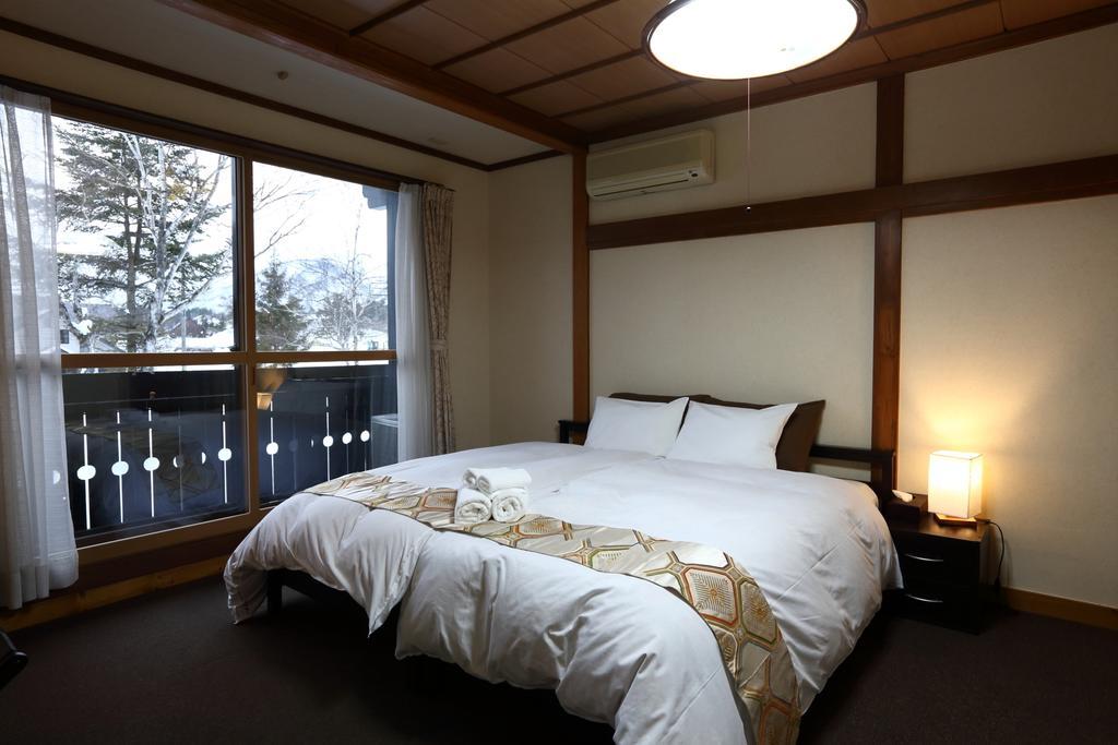 Snowlines Lodge Хакуба Номер фото